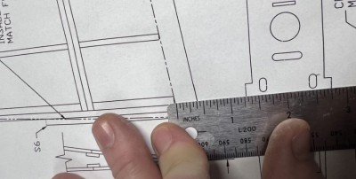 The bottom sheeting is tapered for the last .375&quot; at the TE.  This allows the top sheeting to remain 1/16&quot; thick along the TE and the bottom basically zero or near zero for a finished TE thickness of 1/16&quot; per the rules.  This 3/8&quot; dimension is also used to position the foam core while assembling the sheeting to the core.