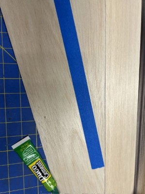 I glue the small triangle first then tackle the entire length of the LE balsa sheet.