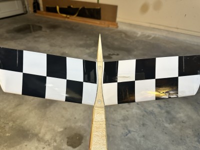 Repaired tail top